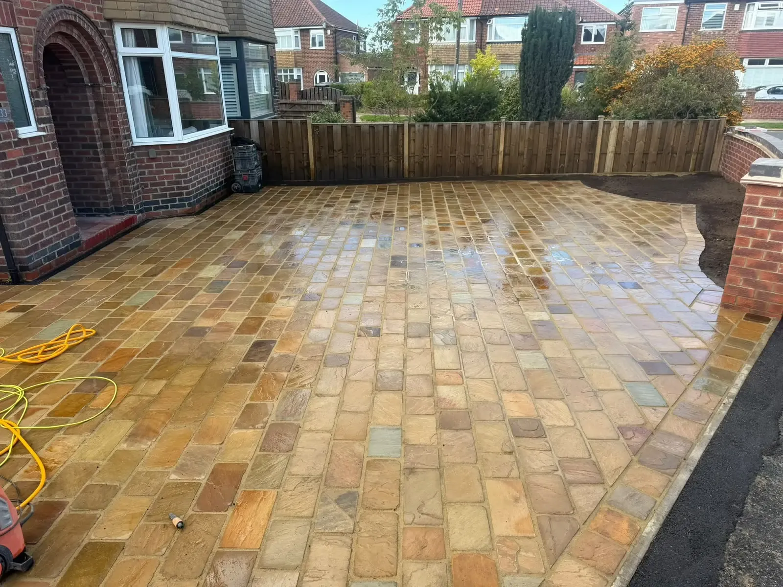 Newly completed natural stone block paved driveway installation by Future Drainage and Groundwork LTD
