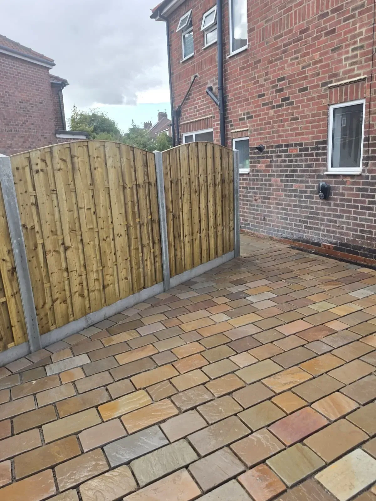 Completed natural stone block paved patio and driveway installation by Future Drainage and Groundwork LTD